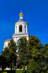 Fototapeta na wymiar Bell tower of Bogolyubovo convent in Vladimir oblast, Russia