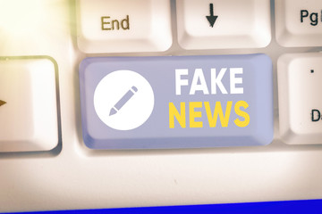 Conceptual hand writing showing Fake News. Concept meaning Giving information to showing that is...
