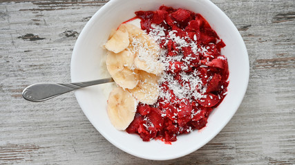 fruit sprinkled with coconut. Vegetarian breakfast