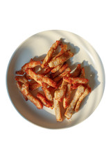 Fried pork in dish on white background.