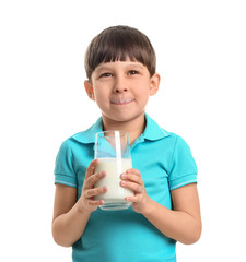 Little boy with milk on white background