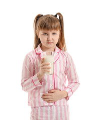 Little girl with milk allergy on white background