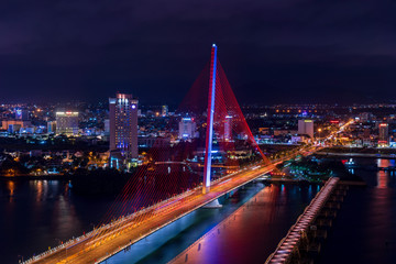 Fototapeta na wymiar Nightscape of Da Nang City with Tran Thi Ly Bridge, Vietnam