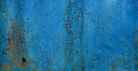 blue coroded metal sheet background with peeling paint flakes