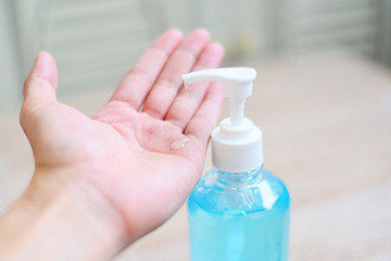 Women washing hands with alcohol gel or antibacterial soap sanitizer - People using bottle of antibacterial sanitizer soap rub clean hand gel hygiene prevention of Covid-19 Coronavirus concept