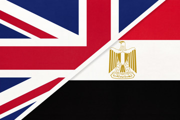 United Kingdom vs Egypt national flag from textile. Relationship between two European and African countries.