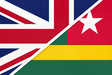 United Kingdom vs Togo national flag from textile. Relationship between two European and African countries.