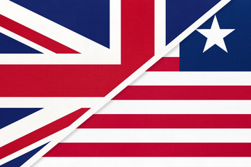 United Kingdom vs Liberia national flag from textile. Relationship between two European and African countries.