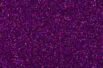 Holographic glitter background, texture in stylish dark violet color.
