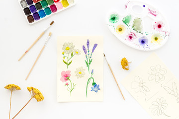 Watercolor painting. Picture with flowers, paints, palette on white background top-down