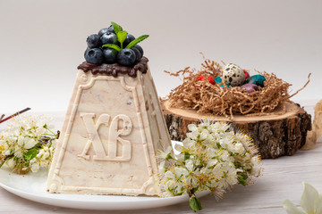 Marble Easter cake with engraving on a white background