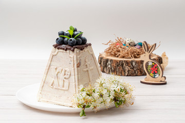 Marble Easter cake with engraving on a white background