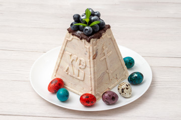 Marble Easter cake with engraving on a white background