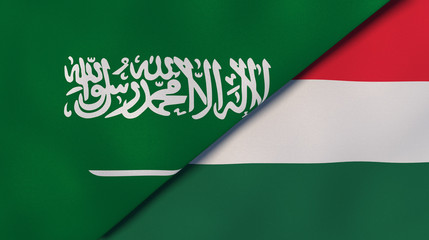 The flags of Saudi Arabia and Hungary. News, reportage, business background. 3d illustration
