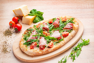 italian pizza on the wooden background