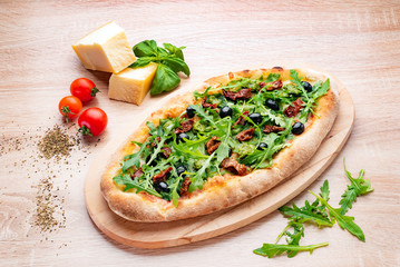 italian pizza on the wooden background