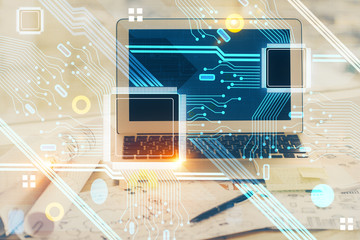 Double exposure of desktop computer and technology theme hologram. Concept of software development.