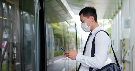 Fototapeta premium man with mask in station