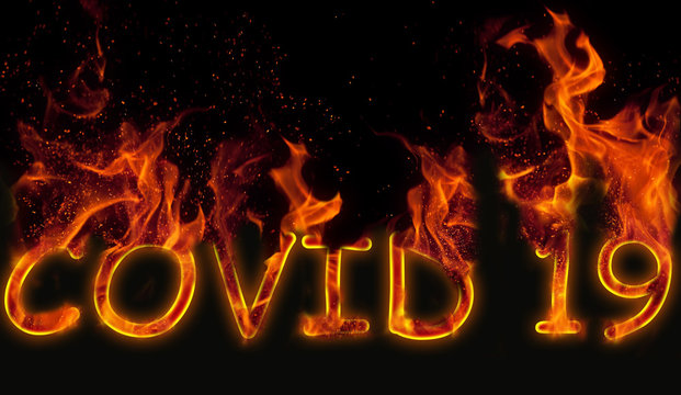 The Designation Of A Covid 19 Virus As Burning Letters On A Black Background