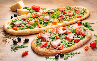 italian pizza on the wooden background