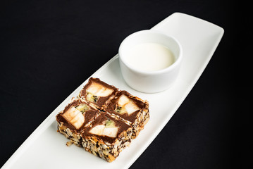 sweet sushi with fruits and chocolate