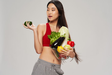 young woman with fruits and vegetables