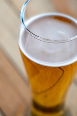 Tall glass with beer. A pint of beer