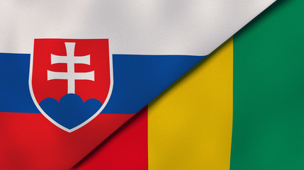 The flags of Slovakia and Guinea. News, reportage, business background. 3d illustration