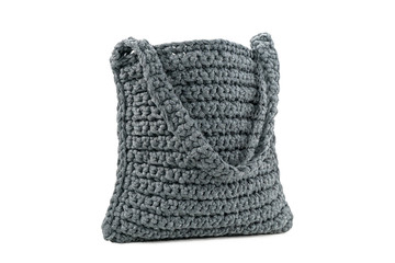 gray knitted handmade bag on white
