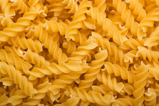 Lots of uncooked fusilli pasta
