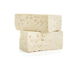 Tasty tofu cheese on white background