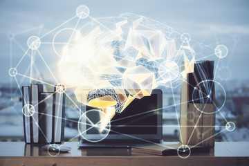 Double exposure of work table with computer and brain sketch hologram. Brainstorming concept.