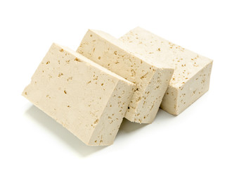 Tasty tofu cheese on white background