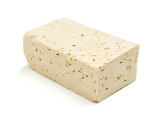 Tasty tofu cheese on white background