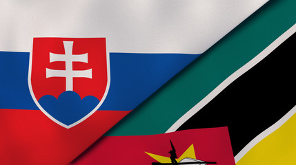 The flags of Slovakia and Mozambique. News, reportage, business background. 3d illustration
