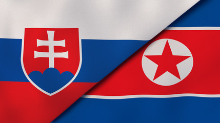 The flags of Slovakia and North Korea. News, reportage, business background. 3d illustration