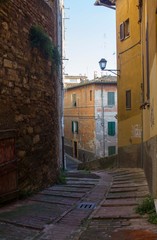 Fototapeta na wymiar Narrow alley in Perugia historic city centre