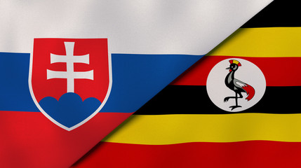 The flags of Slovakia and Uganda. News, reportage, business background. 3d illustration
