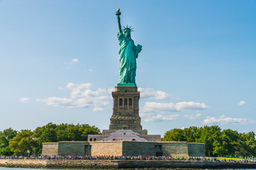Fototapeta premium The statue of Liberty with blue sky background.