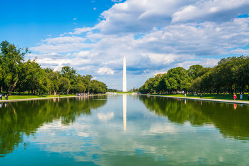 washington dc,Washington monument on sunny day with blue sky background. - Powered by Adobe