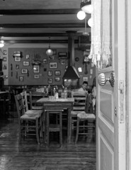 Athens Greece, an old traditional tavern interrior view, brurred details