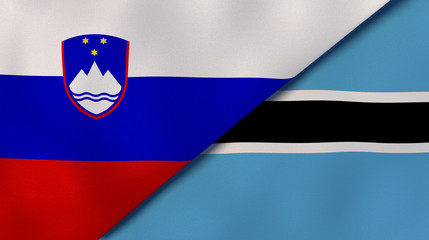The flags of Slovenia and Botswana. News, reportage, business background. 3d illustration
