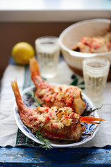 Greek sea bass baked with feta and tomato.style rustic