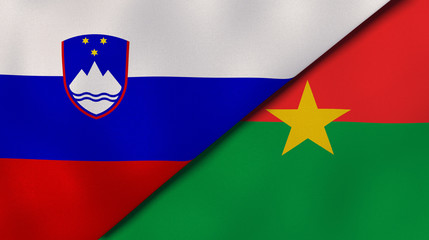 The flags of Slovenia and Burkina Faso. News, reportage, business background. 3d illustration