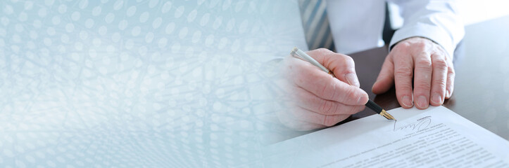 Businessman signing a document; panoramic banner