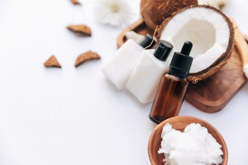 Organic healthy coconut over white background, body care products