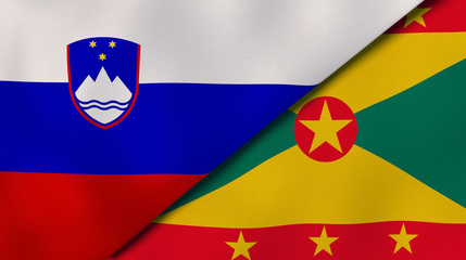 The flags of Slovenia and Grenada. News, reportage, business background. 3d illustration