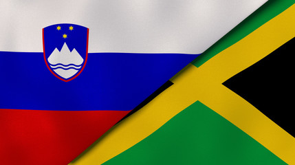 The flags of Slovenia and Jamaica. News, reportage, business background. 3d illustration