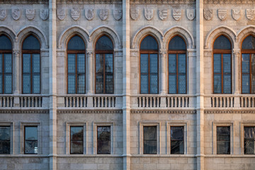 Front view Hungarian Parliament facade. Windows and decoration of walls