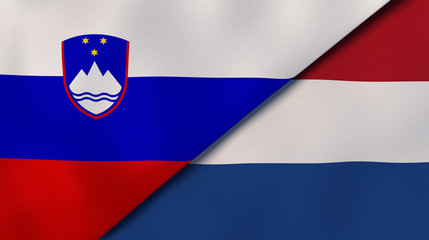 The flags of Slovenia and Netherlands. News, reportage, business background. 3d illustration